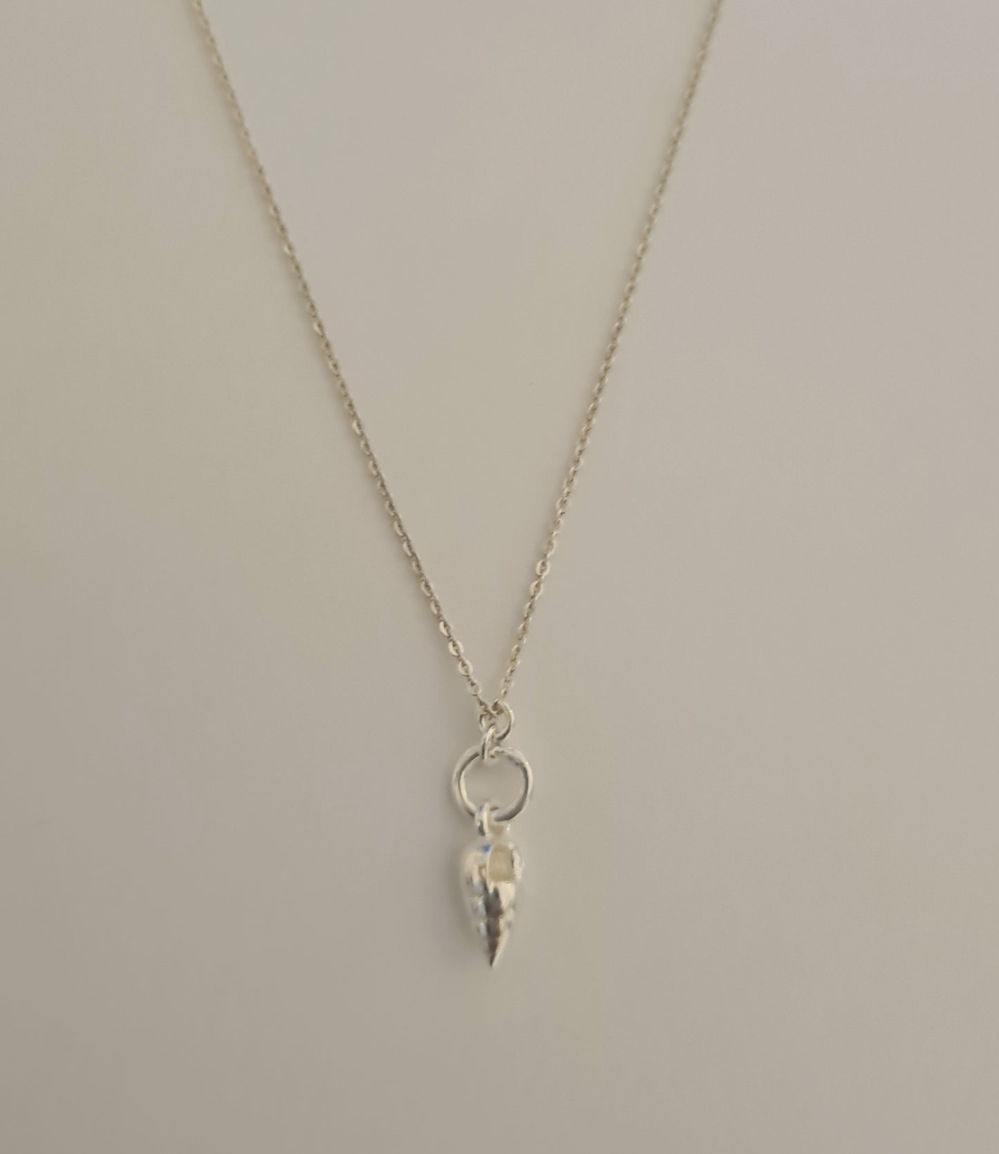 Athena's Silver Conch Shell Pendant