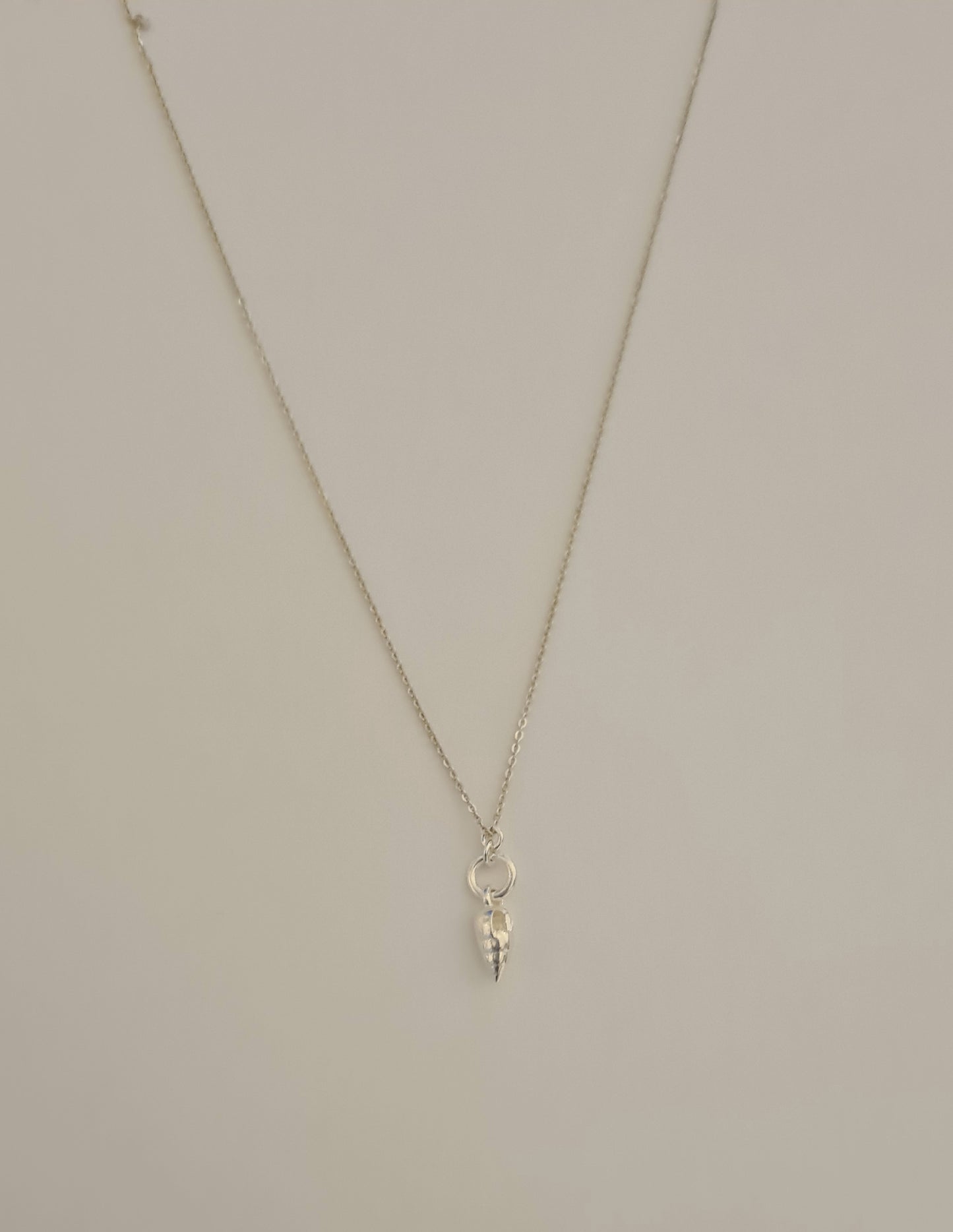 Athena's Silver Conch Shell Pendant